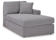 Ashley Furniture Modmax sectional with chaise, angled view showing plush fabric upholstery and modern design.