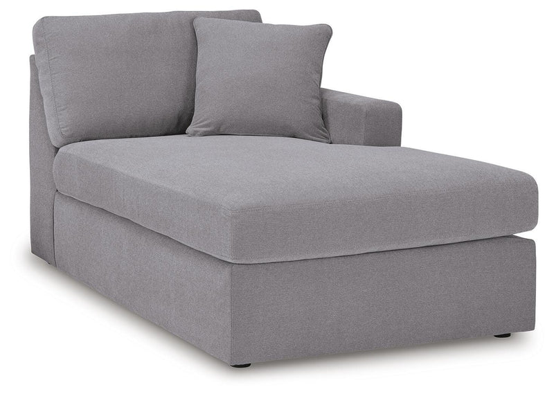 Ashley Furniture Modmax sectional with chaise, angled view showing plush fabric upholstery and modern design.