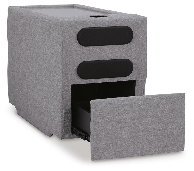 Ashley Furniture Modmax balanced sectional with built-in audio and storage consoles, shown open from an angle view.
