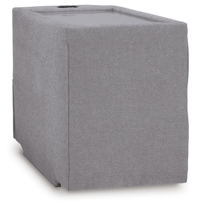 Ashley Furniture Modmax sectional with built-in audio and storage consoles, featuring plush cushions and modern design.