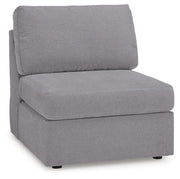 Ashley Furniture Modmax 6-piece sectional sofa shown from an angled view, featuring modern upholstery and spacious seating.