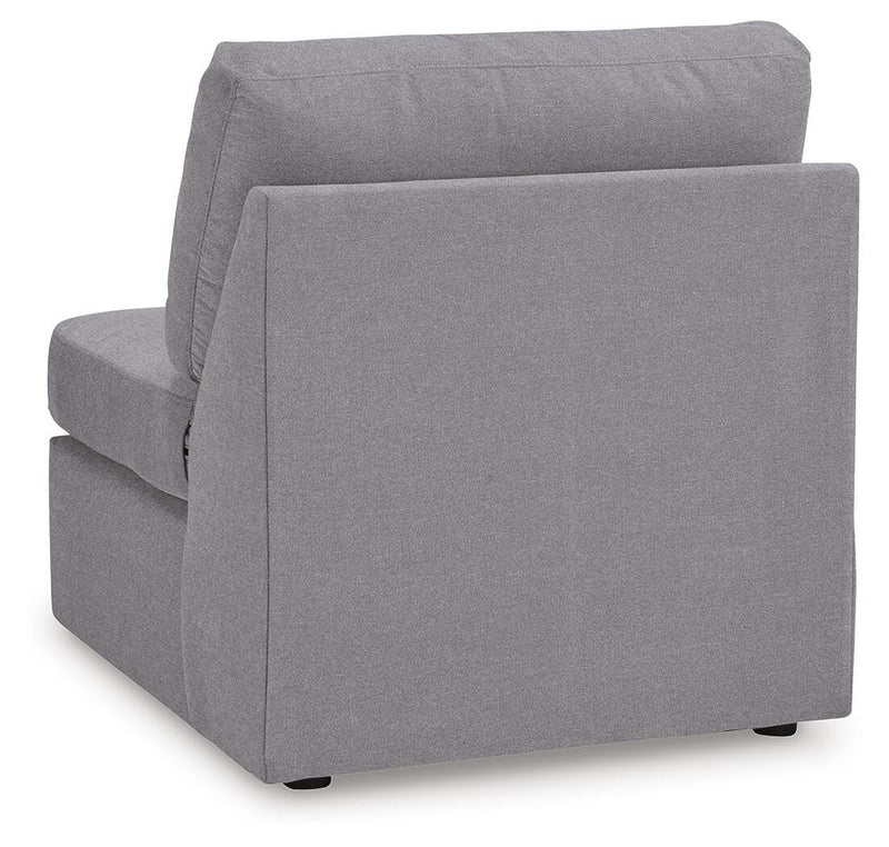 Ashley Furniture Modmax sectional with built-in audio, storage consoles, and plush seating in a modern living room setting.
