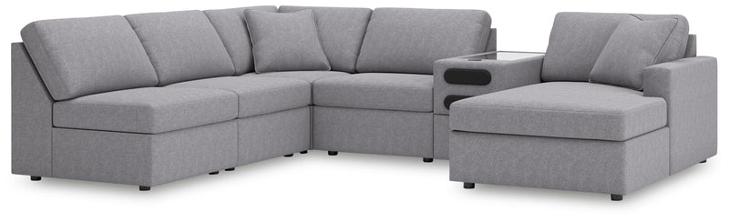 Ashley Furniture Modmax sectional with chaise, featuring modern design and plush cushions in a stylish living room setting.