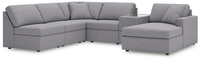 Ashley Furniture Modmax sectional with chaise, featuring modern design and plush seating in a stylish living room setting.