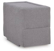 Ashley Furniture Modmax sectional with built-in audio, storage consoles, and a modern design, viewed from an angled close-up.