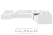 Modmax balanced sectional sofa with built-in audio and storage consoles by Ashley Furniture, showing modern design and plush seating.