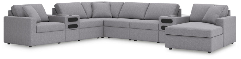 Ashley Furniture Modmax sectional with integrated audio system and chaise, featuring modern design and plush upholstery.