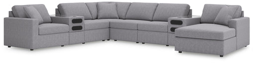 Ashley Furniture Modmax sectional with integrated audio system and chaise, featuring modern design and plush upholstery.