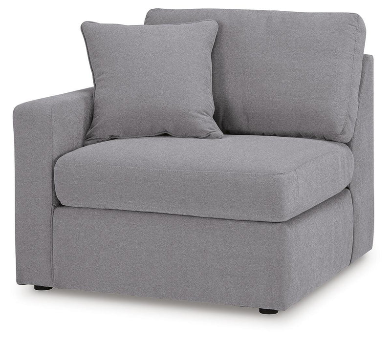 Ashley Furniture Modmax sectional with built-in audio, storage consoles, and modern design, shown from an angled view.