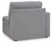 Ashley Furniture Modmax sectional with built-in audio, storage consoles, and plush seating, shown from the back.