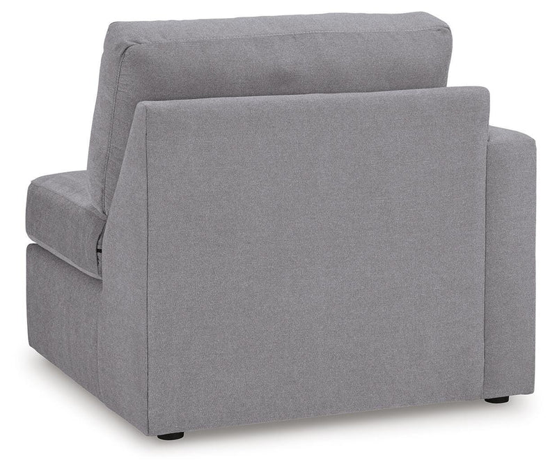 Ashley Furniture Modmax sectional with built-in audio, storage consoles, and plush seating, shown from the back.