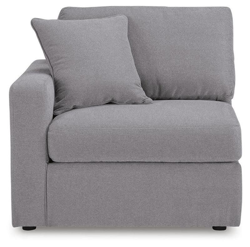 Ashley Furniture Modmax sectional with built-in audio and storage consoles, featuring a modern design and plush seating.