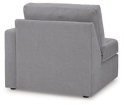 Ashley Furniture Modmax sectional with built-in audio, storage consoles, and plush seating in a modern living room setting.