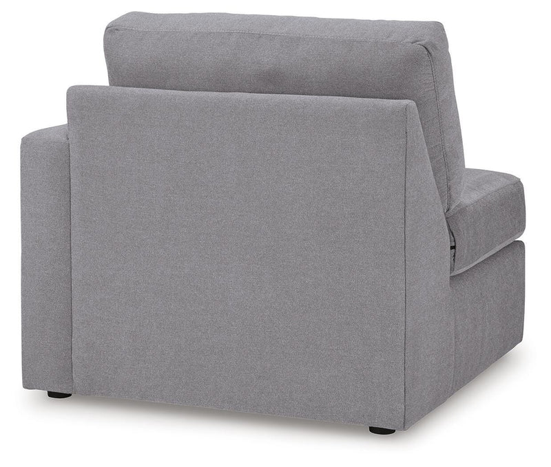 Ashley Furniture Modmax sectional with built-in audio, storage consoles, and plush seating in a modern living room setting.