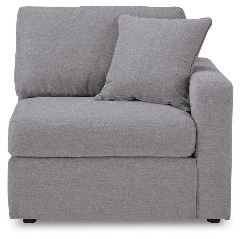 Ashley Furniture Modmax sectional with built-in audio and storage consoles, showing its modern design and plush seating.