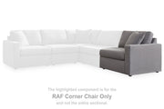 Ashley Furniture Modmax balanced sectional sofa with built-in audio and storage consoles, featuring modern design and plush seating.