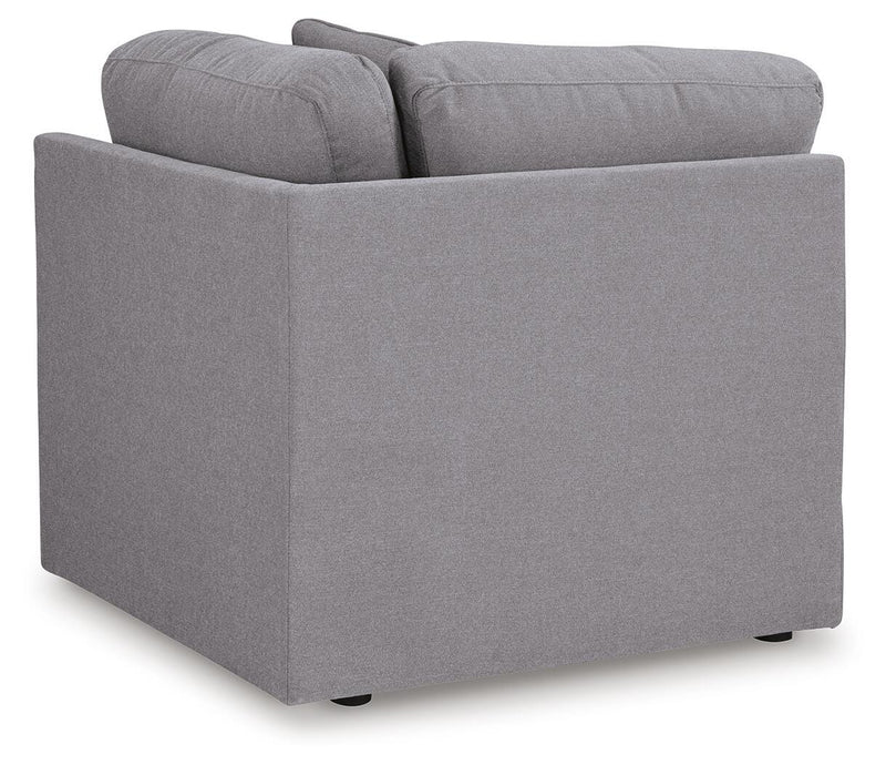 Ashley Furniture Modmax sectional with built-in audio and storage consoles, featuring a modern design and plush seating.