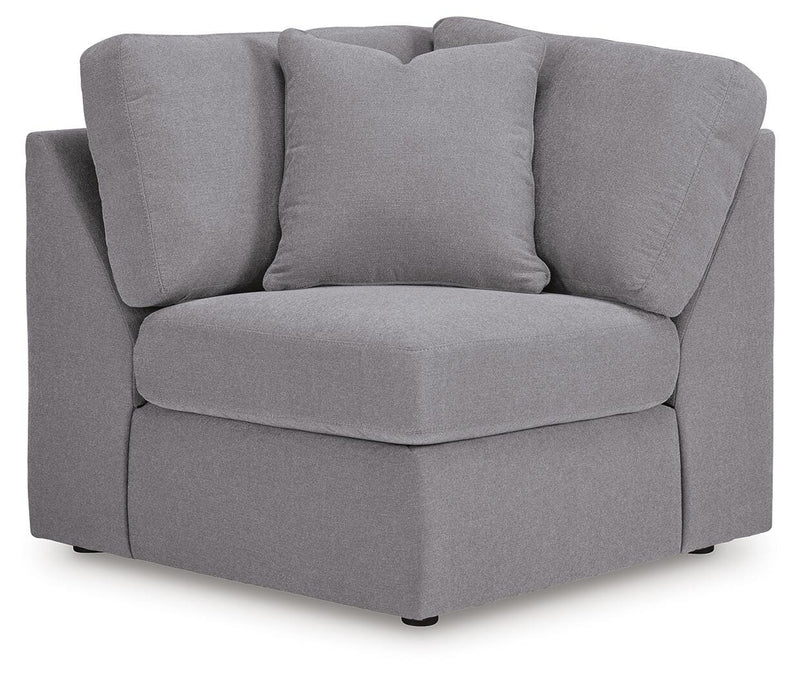 Ashley Furniture Modmax balanced sectional with built-in audio and storage consoles, featuring plush cushions and modern design.