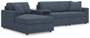 Ashley Furniture Modmax sectional with chaise, featuring plush upholstery and modern design, shown in a stylish living room setting.