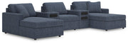 Ashley Furniture Modmax double chaise sectional with built-in audio consoles, featuring plush cushions and modern design.