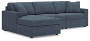 Ashley Furniture Modmax sectional with chaise, featuring modern design and plush upholstery in a stylish living room setting.