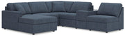 Ashley Furniture Modmax sectional with chaise, featuring plush fabric and modern design for comfortable seating.