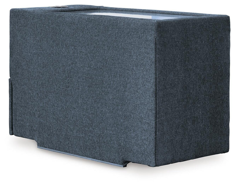 Modmax sectional sofa by Ashley Furniture with built-in audio and storage consoles, showing plush cushions and modern design.