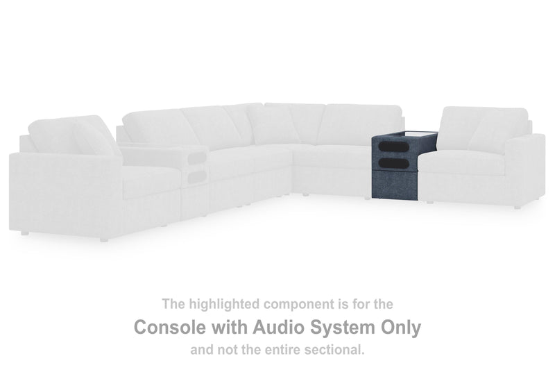 Ashley Furniture Modmax sectional with built-in audio and storage consoles, featuring modern design and plush seating.