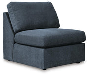 Ashley Furniture Modmax sectional with chaise, angled view showing plush cushions and modern design for stylish living room seating.