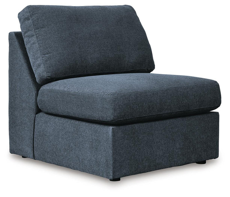 Ashley Furniture Modmax sectional with chaise, angled view showing plush cushions and modern design for stylish living room seating.