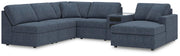 Ashley Furniture Modmax sectional with chaise in a modern fabric, showing the spacious seating and contemporary design.