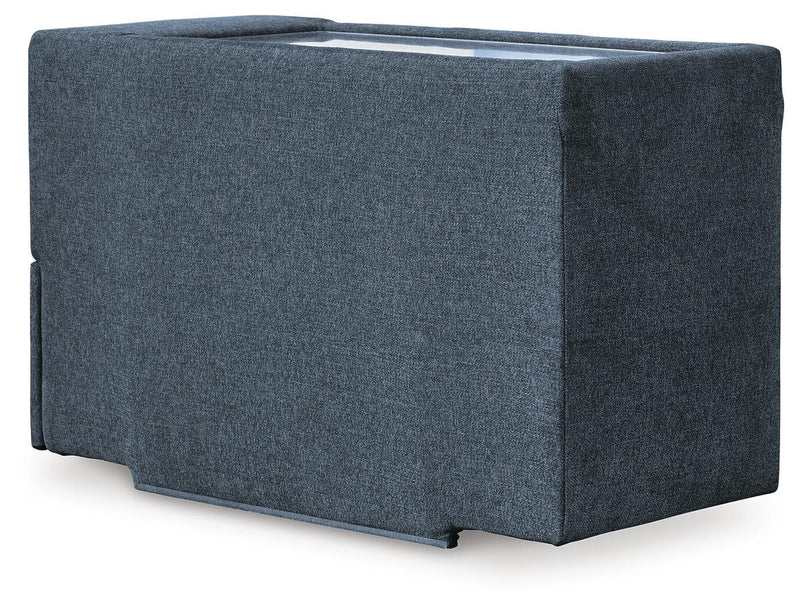 Ashley Furniture Modmax sectional with built-in audio, storage consoles, and plush seating, shown from the back view.