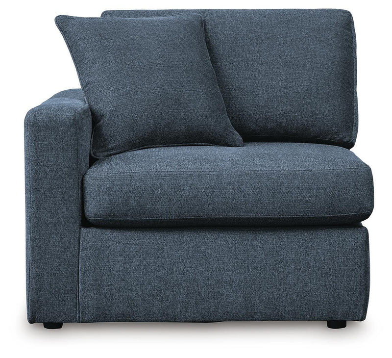 Ashley Furniture Modmax sectional with built-in audio, storage consoles, and modern design, shown from a head-on view.