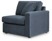 Ashley Furniture Modmax balanced sectional with built-in audio and storage consoles, shown from an angled perspective.