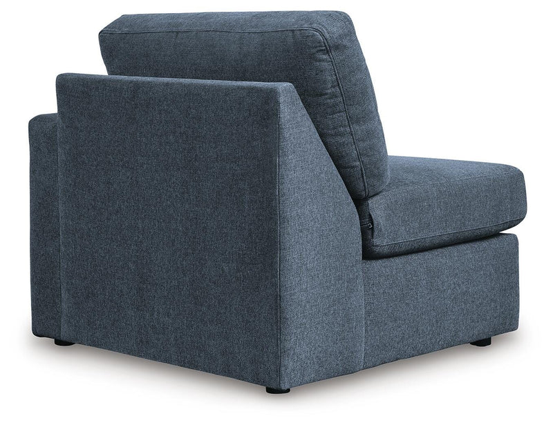 Ashley Furniture Modmax sectional with built-in audio and storage consoles, featuring plush cushions and modern design.