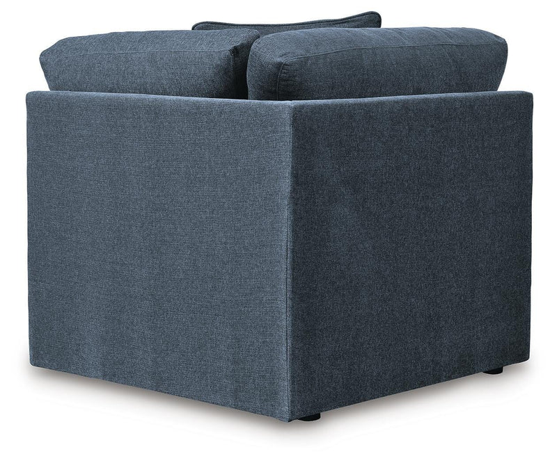 Ashley Furniture Modmax sectional with built-in audio and storage consoles, featuring modern design and plush seating.