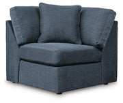 Ashley Furniture Modmax balanced sectional with integrated audio and storage consoles, shown in a head-on view.