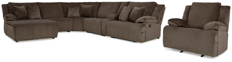 Ashley Furniture Top Tier living room set with sofa and armchair in a modern design, featuring neutral fabric upholstery and decorative cushions.