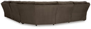 Ashley Furniture Top Tier reclining sectional with chaise, featuring plush cushions and a comfortable backrest, viewed from the back.