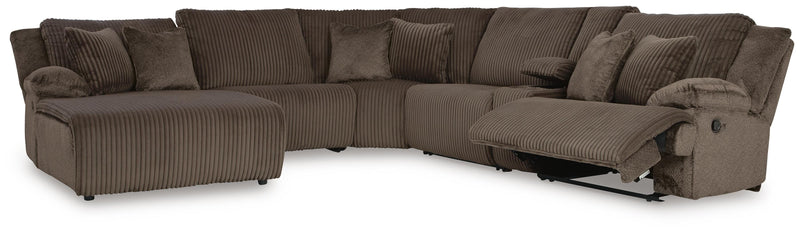 Ashley Furniture Top Tier reclining sectional with chaise, featuring plush upholstery and multiple reclining seats.