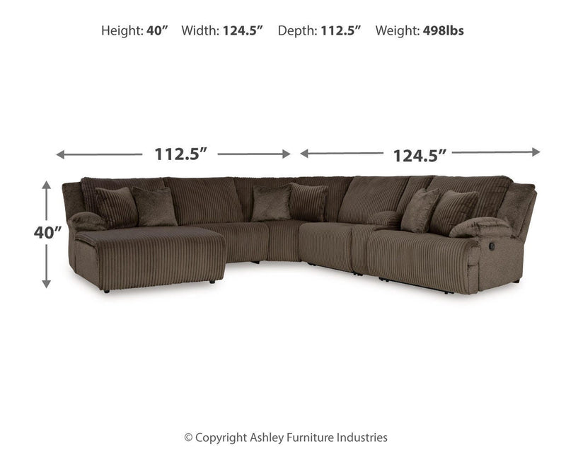 Ashley Furniture Top Tier living room set with plush sofa, armchair, and matching coffee table in a modern design.