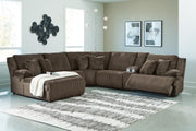 Ashley Furniture Top Tier reclining sectional with chaise, featuring plush fabric, multiple seating, and adjustable recline.