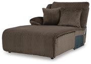 Ashley Furniture Top Tier sofa chaise sectional with plush cushions and modern design, shown from an angled view.