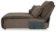 Ashley Furniture Top Tier sectional sofa with chaise, featuring plush cushions and modern design in a fabric upholstery.