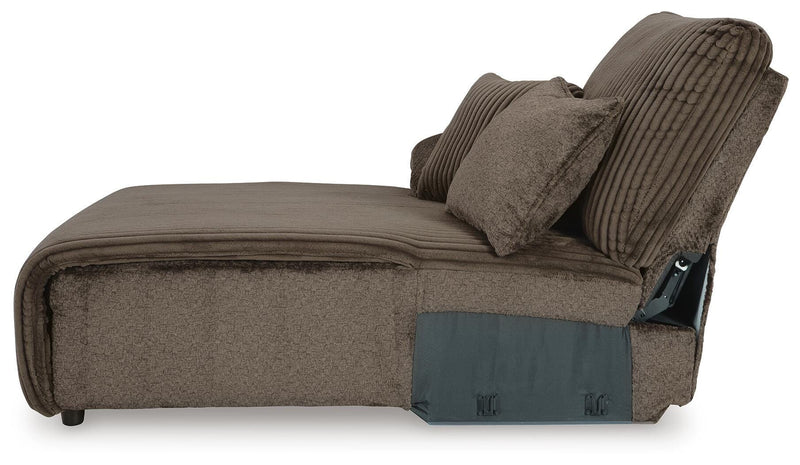 Ashley Furniture Top Tier sectional sofa with chaise, featuring plush cushions and modern design in a fabric upholstery.