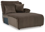 Ashley Furniture Top Tier sectional sofa with chaise, featuring plush cushions and modern design, shown from an angled view.
