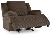 Ashley Furniture Top Tier living room set with a sofa and armchair, showcasing plush cushions and modern design in a well-lit room.