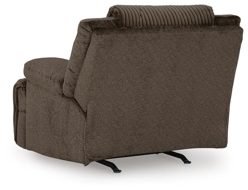 Ashley Furniture Top Tier recliner with plush upholstery and padded armrests, shown from the back in the image.