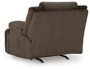 Ashley Furniture Top Tier living room set with plush sofas and coordinating armchair, shown in a modern living room setting.