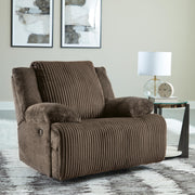 Ashley Furniture Top Tier Recliner in dark brown fabric, fully reclined with plush cushioning and wooden legs.
